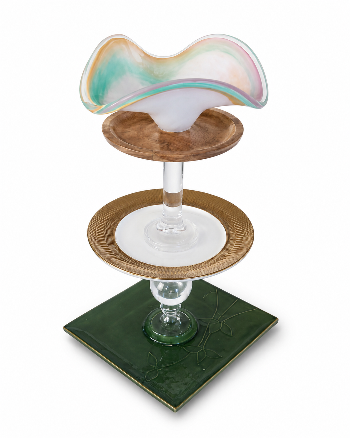 The Tangier three-tier serving tray with green ceramic base, glass stem, gold-rimmed plate, wood tier, and iridescent art glass bowl